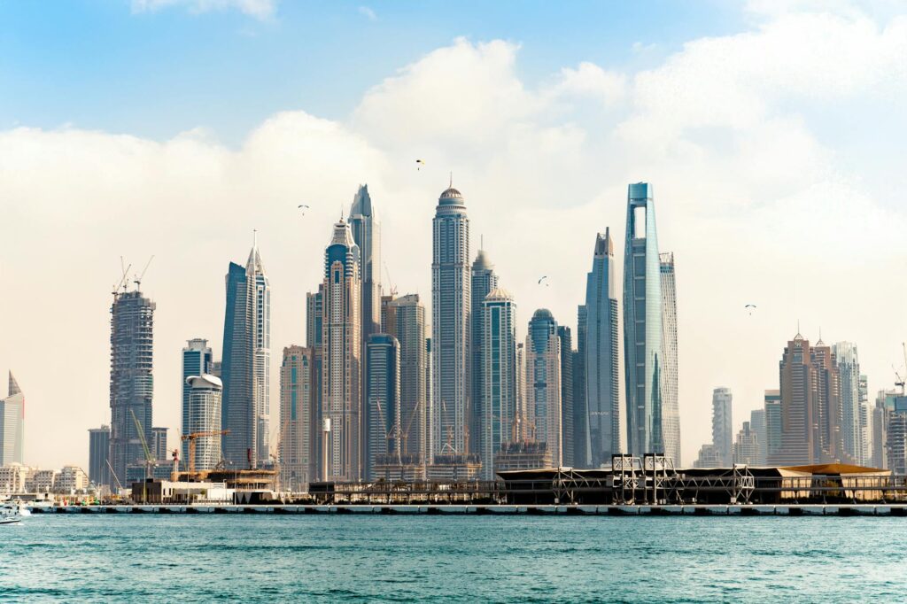 Dubai skyline representing real estate market with digital marketing analytics overlay, symbolizing real estate SEO success for new businesses.