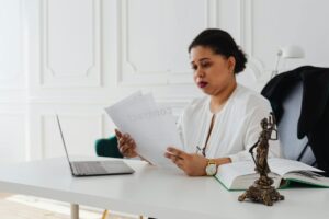 A lawyer reviewing SEO analytics on a laptop, demonstrating the application of Law Firm SEO Services to a legal practice.