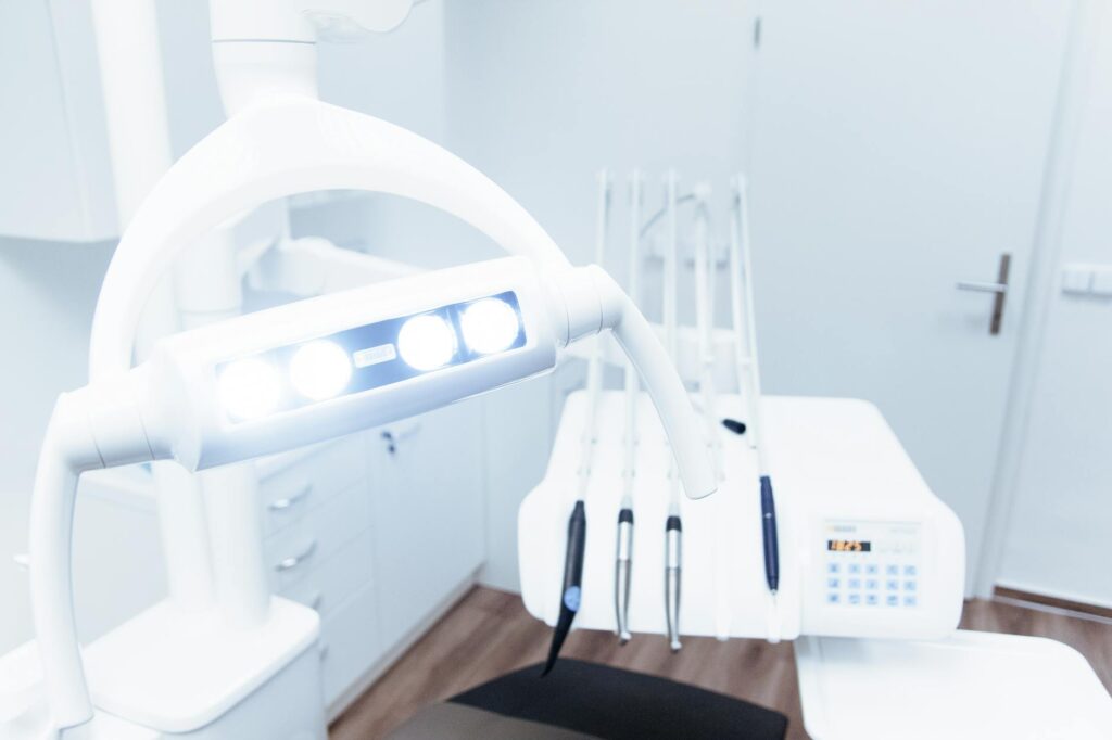 Modern dental clinic reception with digital marketing analytics on screen, representing SEO for dental clinics in UAE.