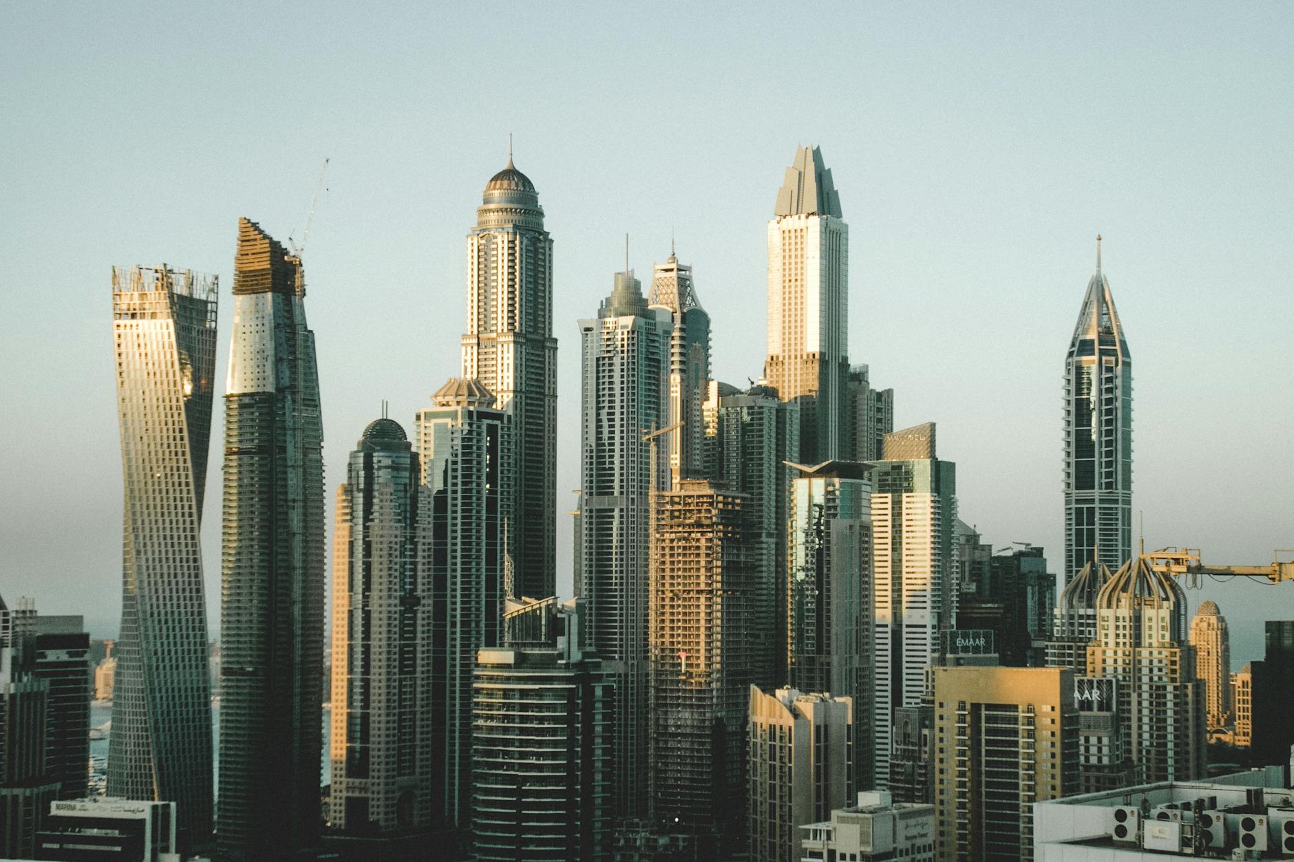 Digital marketing strategies for luxury brands in UAE with a modern Dubai skyline in the background, symbolizing growth and sophistication.